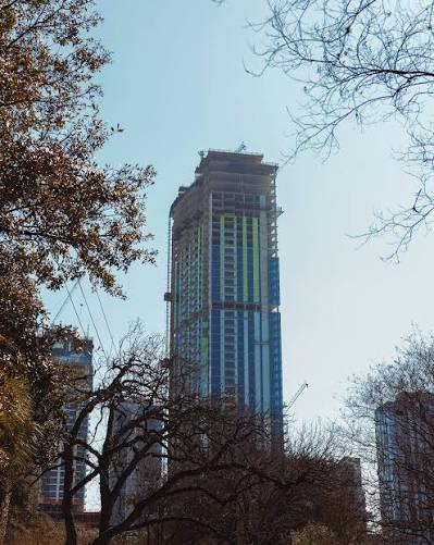 High-rise glazing work in progress at Travis Tower in Austin, Texas